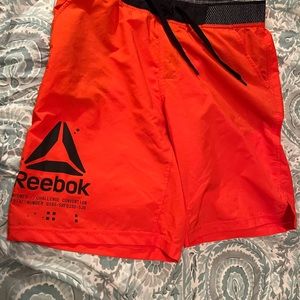 Men’s Reebok athletic shorts- orange size medium